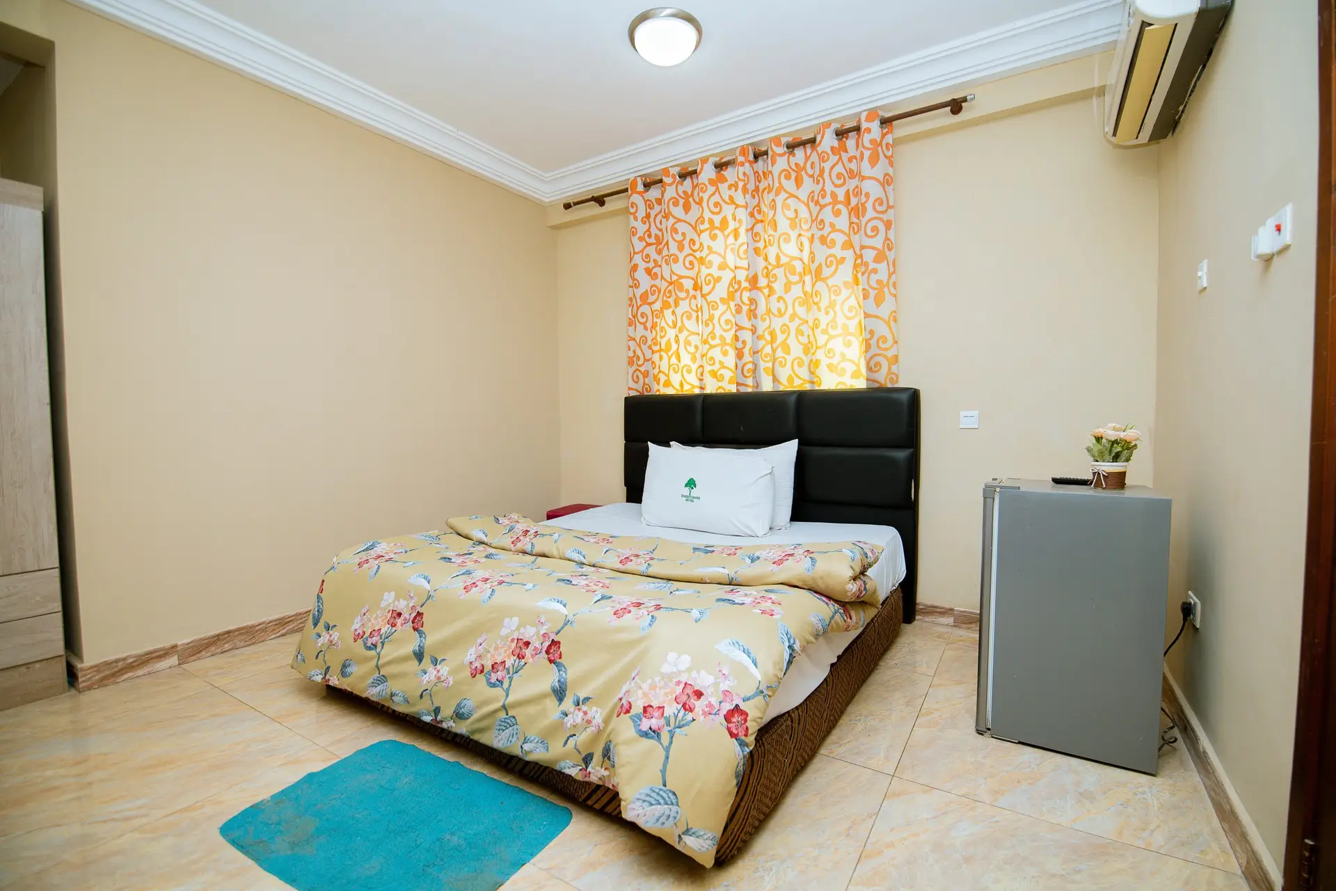 Photo of Deluxe Bedroom with Refrigerator and AC